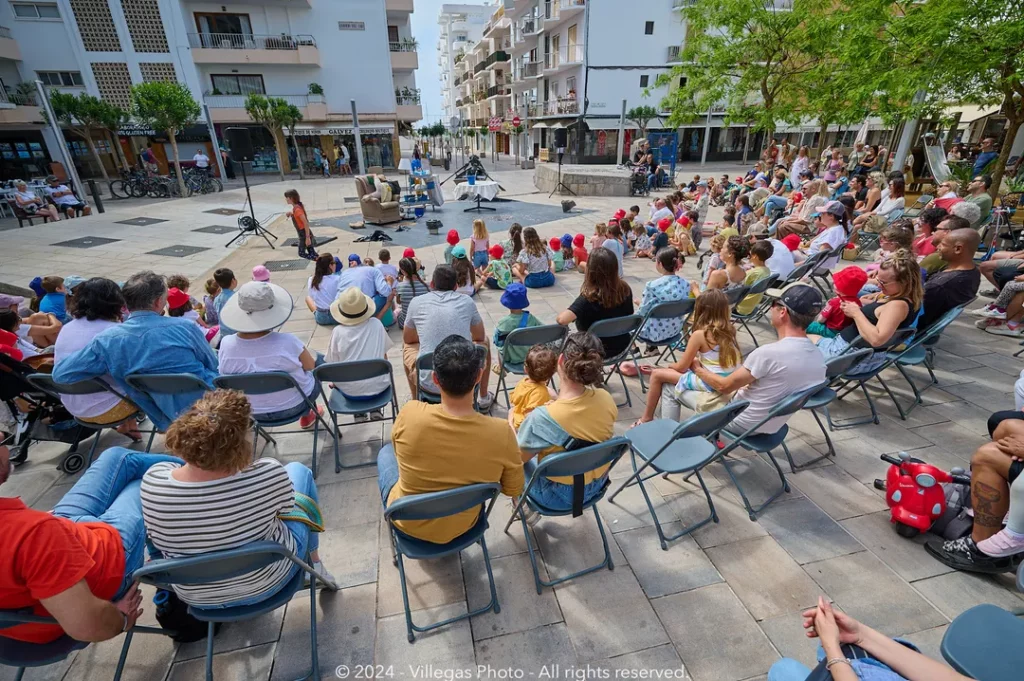 Audience attending one of the street performances during the Barruguet 2024 Festival.